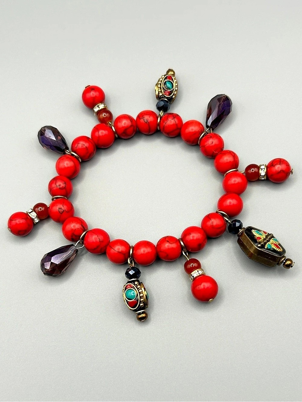 Red Beaded Charm Bracelet with Decorative Dangles
